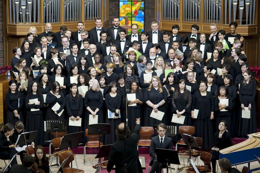 group of people singing in a choir